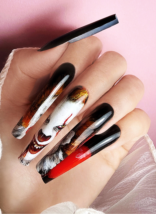 Czarne i krwiste paznokcie na Halloween: inspiracje na mroczny manicure